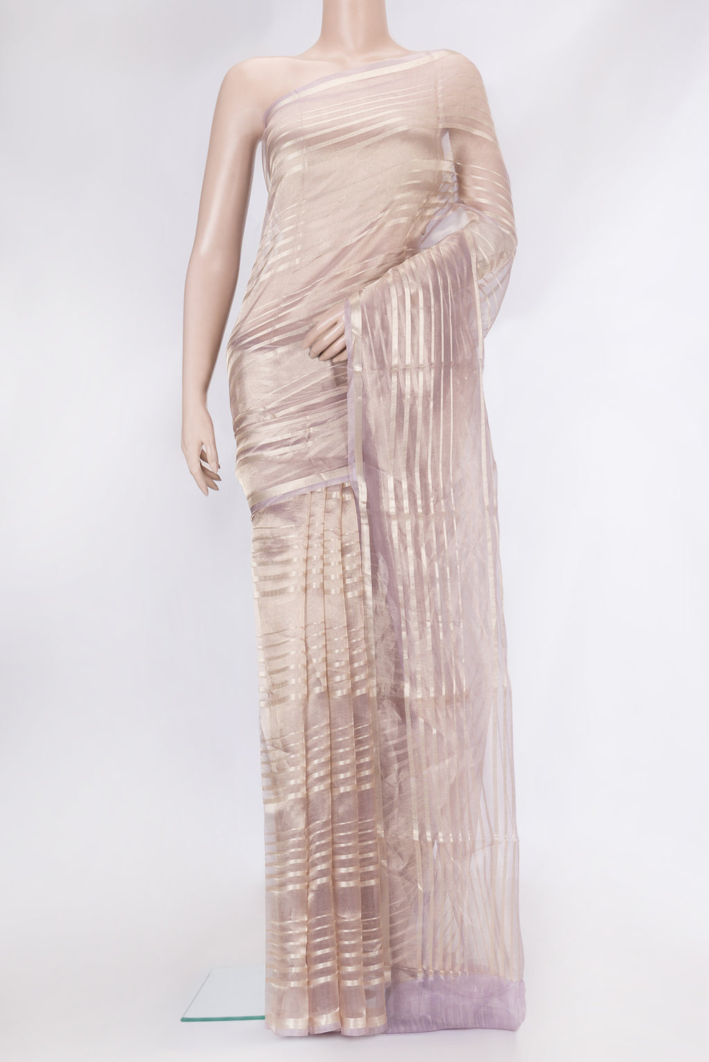 Rose Gold Dual Tone Organza Silk Saree with Stripes on the body and Zari Border.  displayed on a mannequin