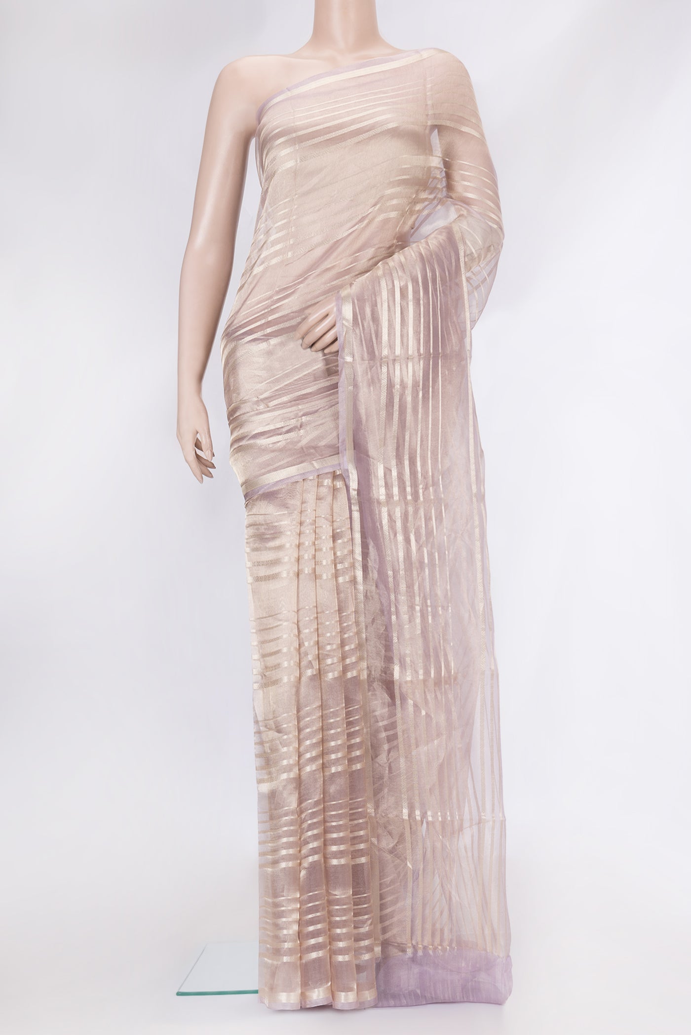 Rose Gold Dual Tone Organza Silk Saree with Stripes on the body and Zari Border.  displayed on a mannequin