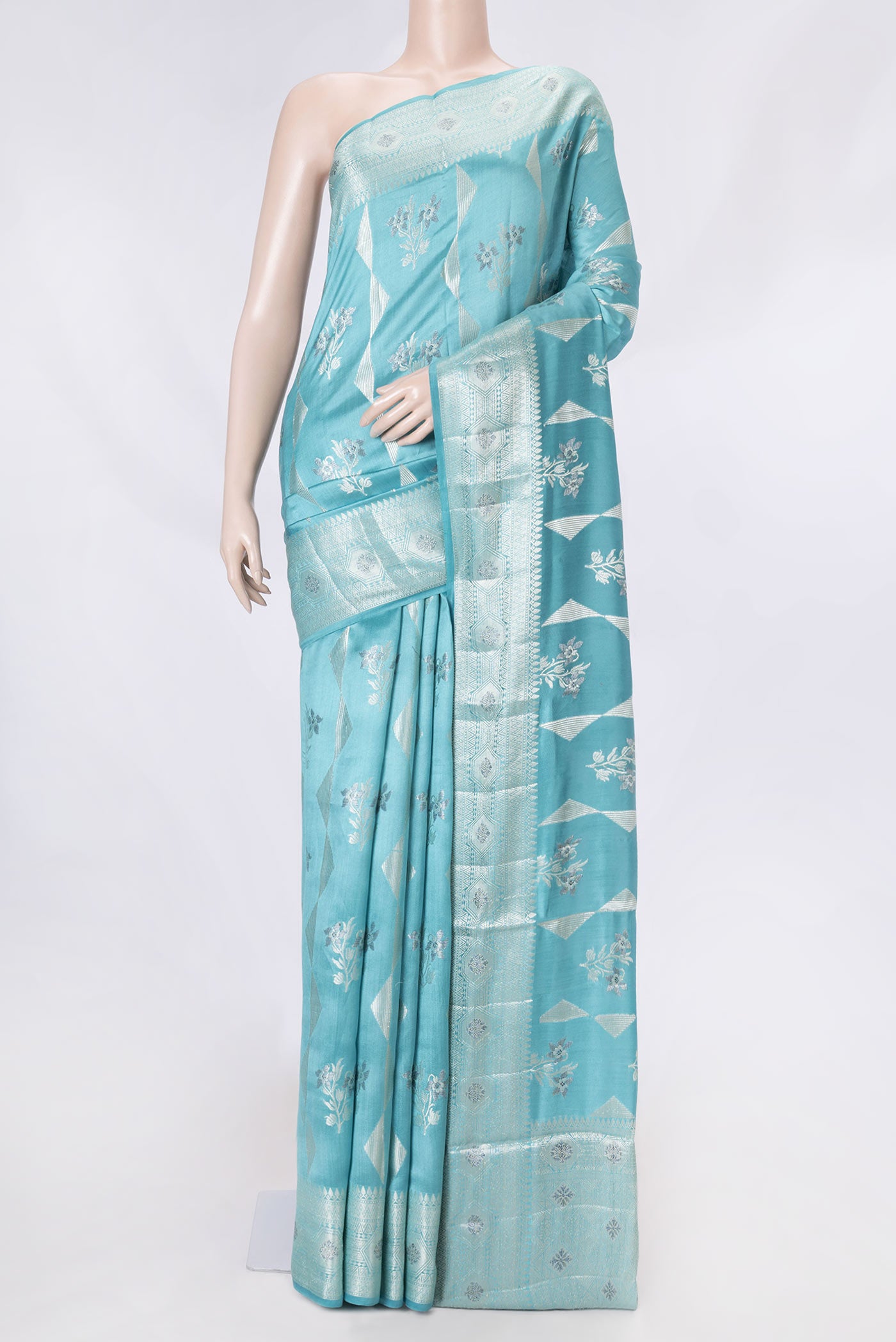 Light Blue Banarasi Raw Silk Saree with Zari Butta on the body and Zari Border displayed on a mannequin