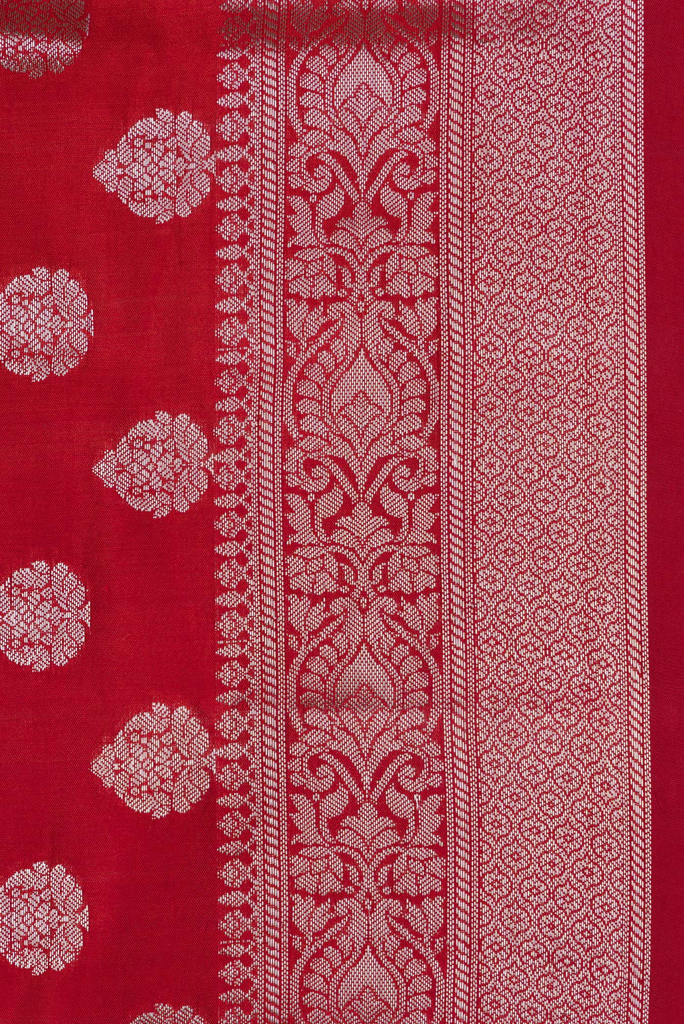 Border image of Red Dual Tone Tussar Silk Saree with Zari Butta on the body and Zari Border. 