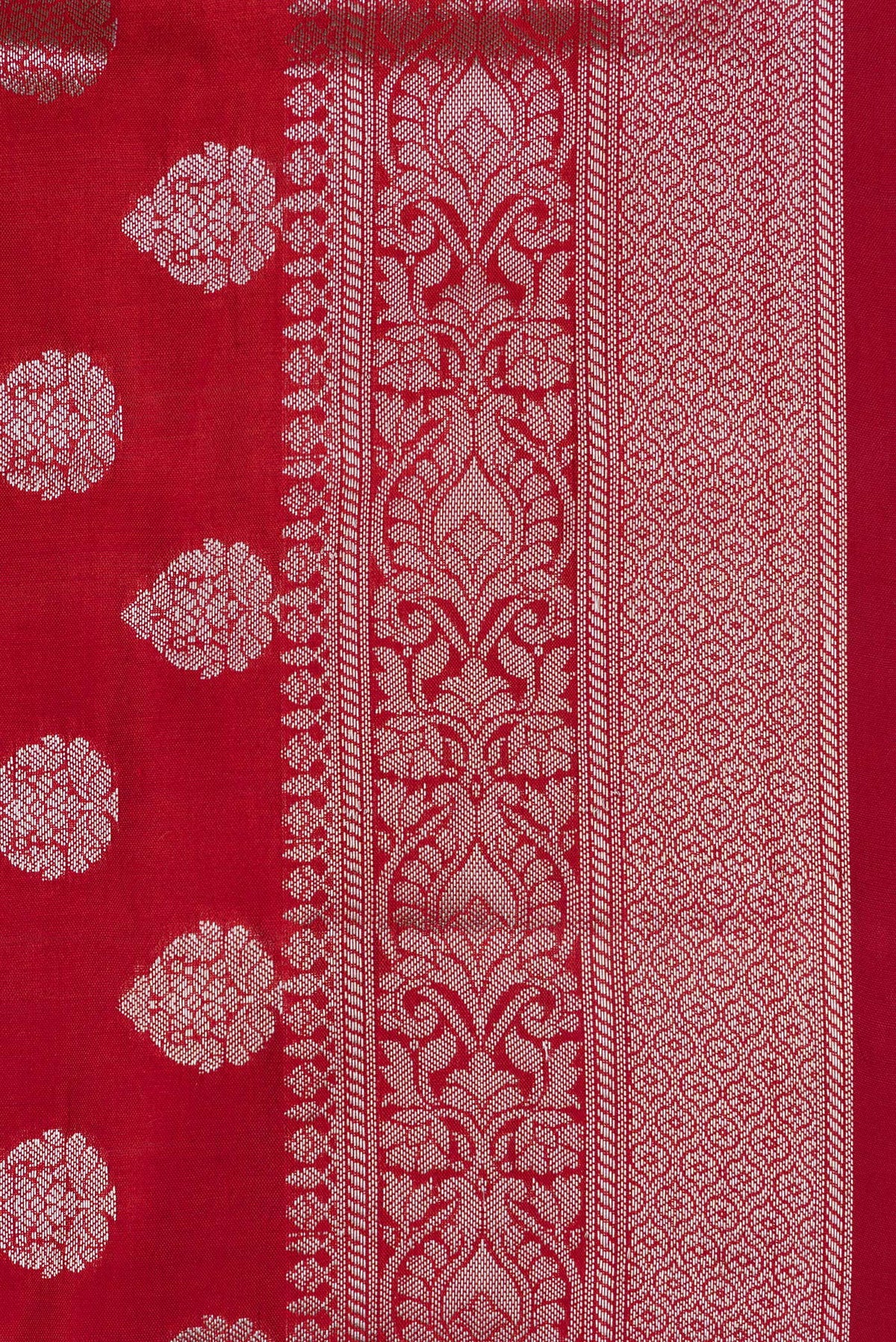 Border image of Red Dual Tone Tussar Silk Saree with Zari Butta on the body and Zari Border. 