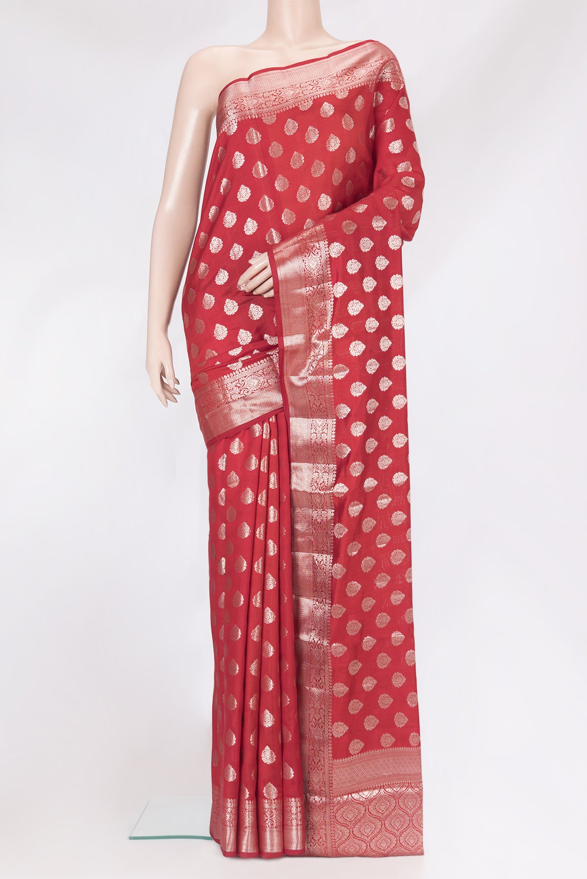 Red Dual Tone Tussar Silk Saree with Zari Butta on the body and Zari Border.  displayed on a mannequin