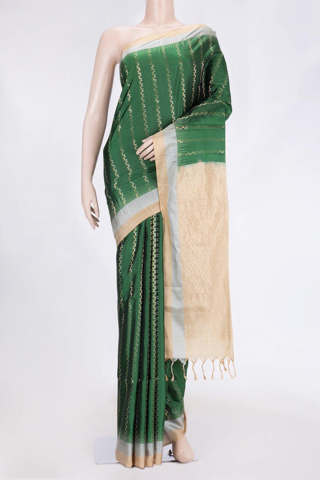 Green Dual Tone Soft Silk Saree with Zari Butta on the body and Zari Border.  displayed on a mannequin