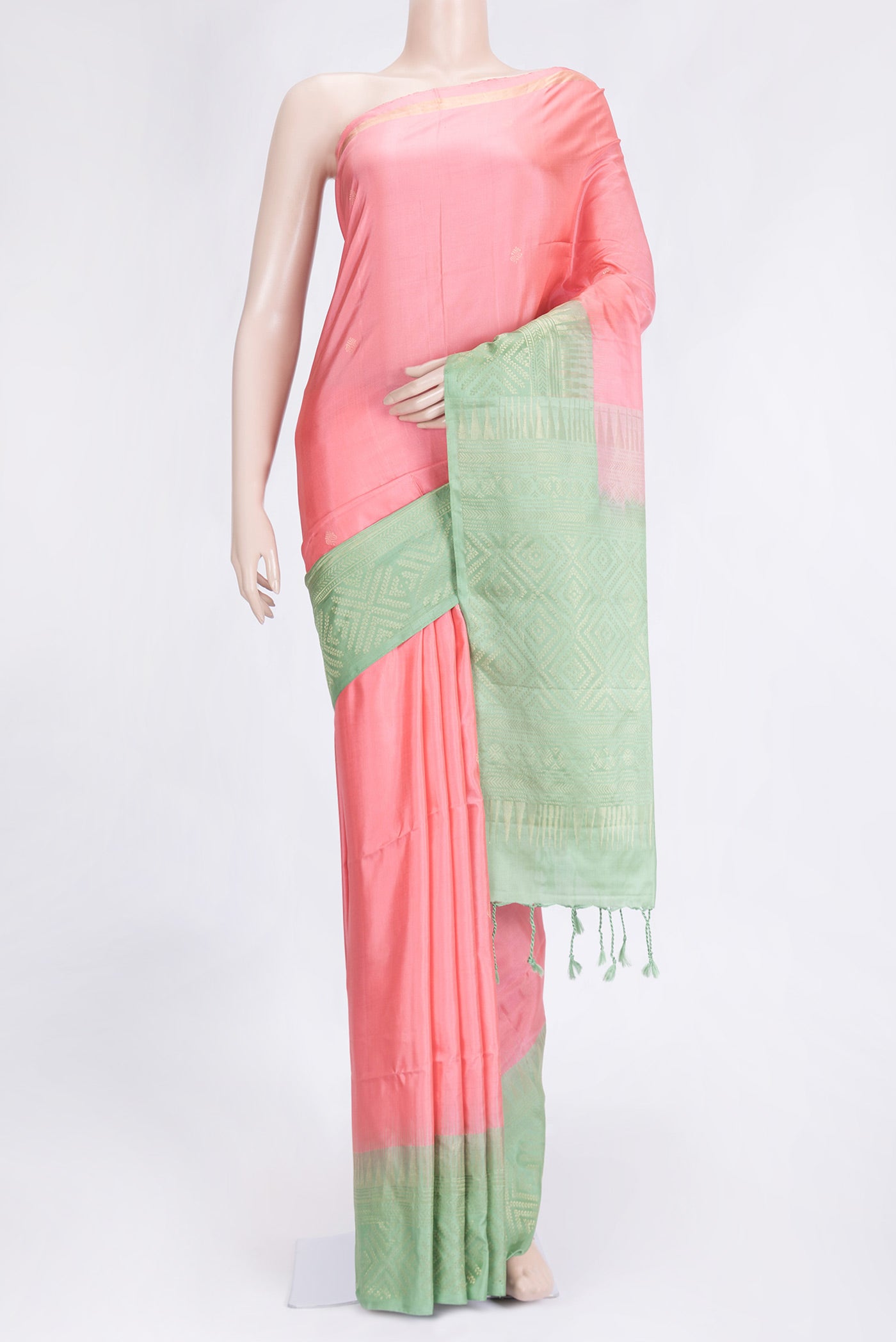 Pink Dual Tone Soft Silk Saree with Zari Butta on the body and Fancy Border.  displayed on a mannequin