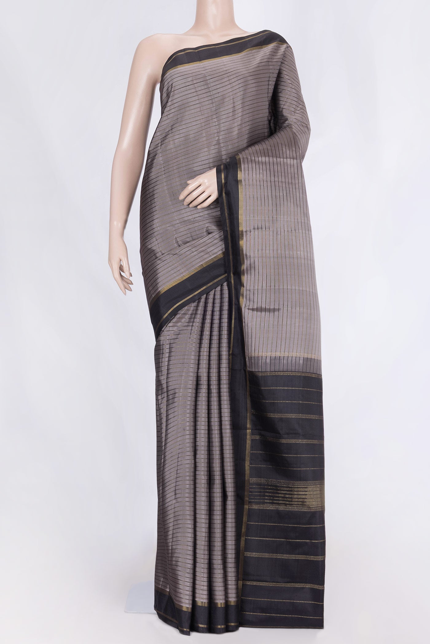 Grey Dual Tone Kanchipuram Silk Saree with Stripes on the body and Zari Border displayed on a mannequin