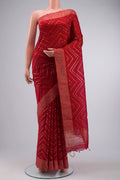 Red Raw Silk Saree with Embroidery on the body and Zari Border displayed on a mannequin