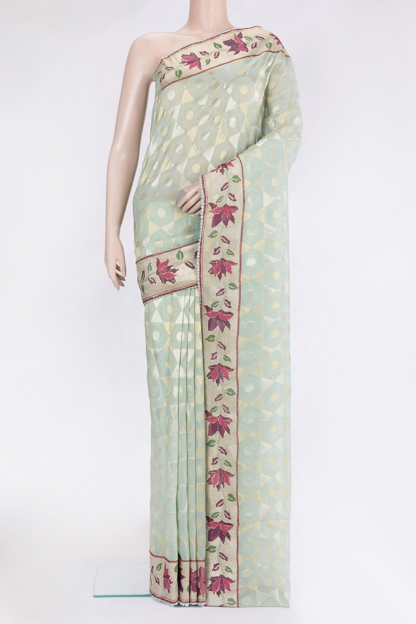 Light Green Dual Tone Organza Silk Saree with Zari Brocade on the body and Embroidery Border.  displayed on a mannequin