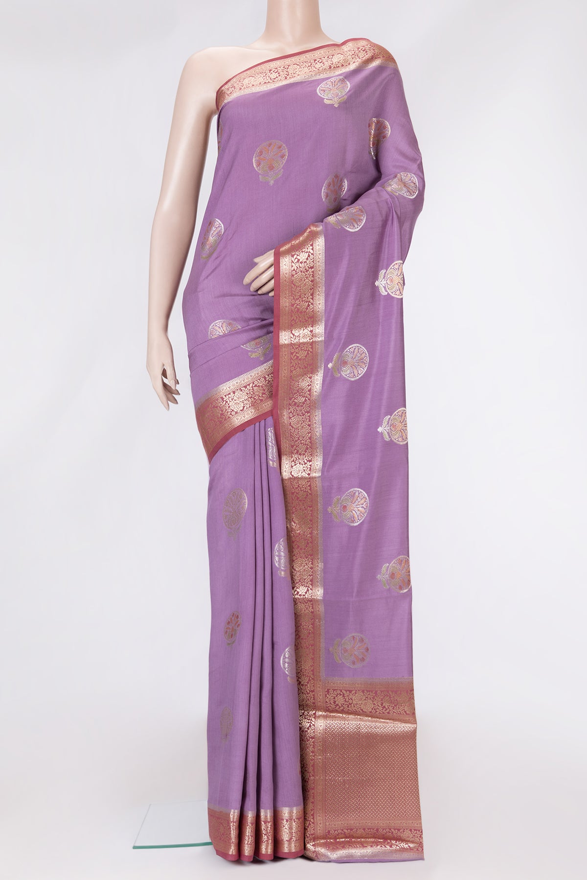 Lavender Dual Tone Tussar Silk Saree with Zari Butta on the body and Zari Border.  displayed on a mannequin