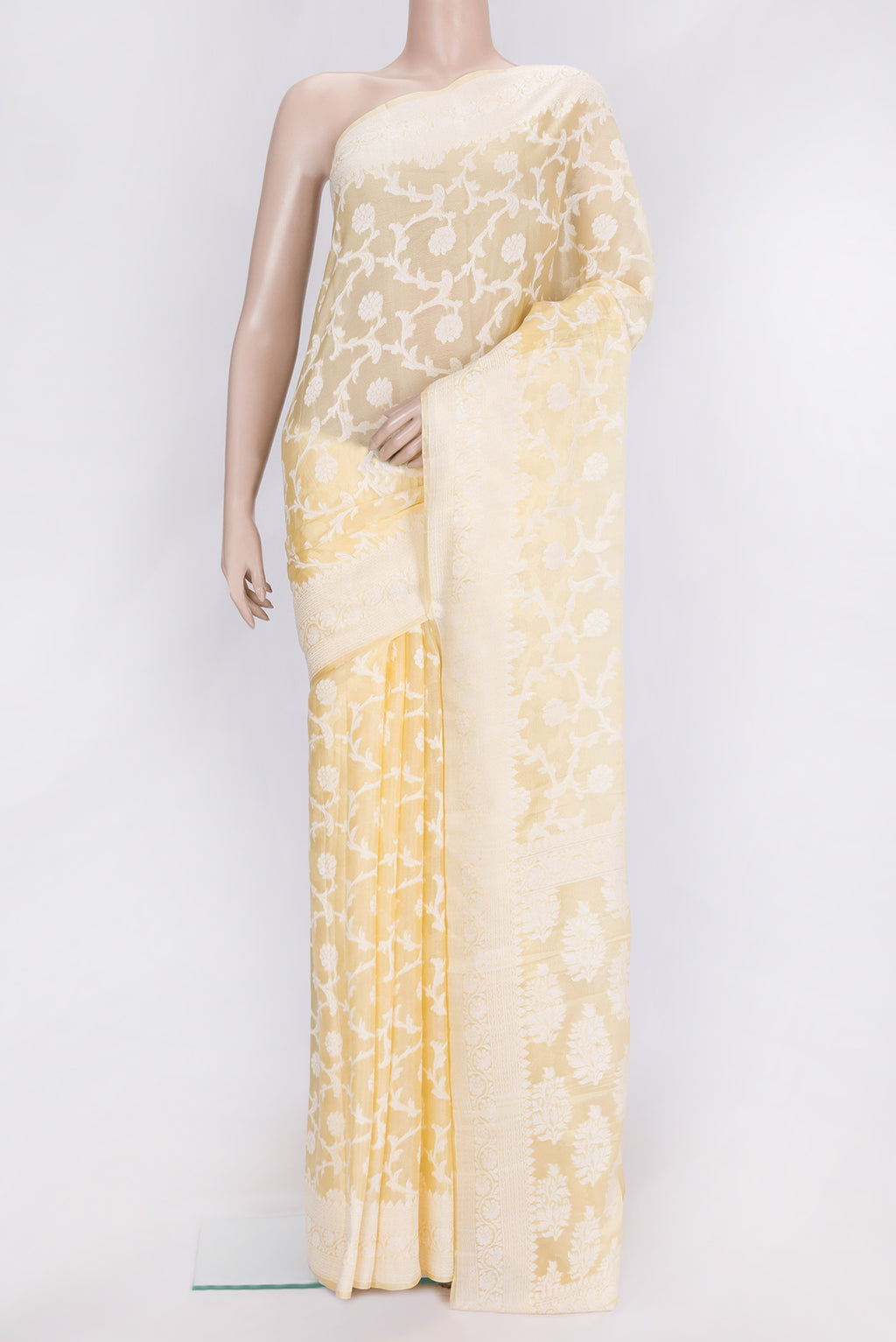 Sandal Dual Tone Mysore Georgette Saree with Zari Brocade on the body and Thread Border.  displayed on a mannequin