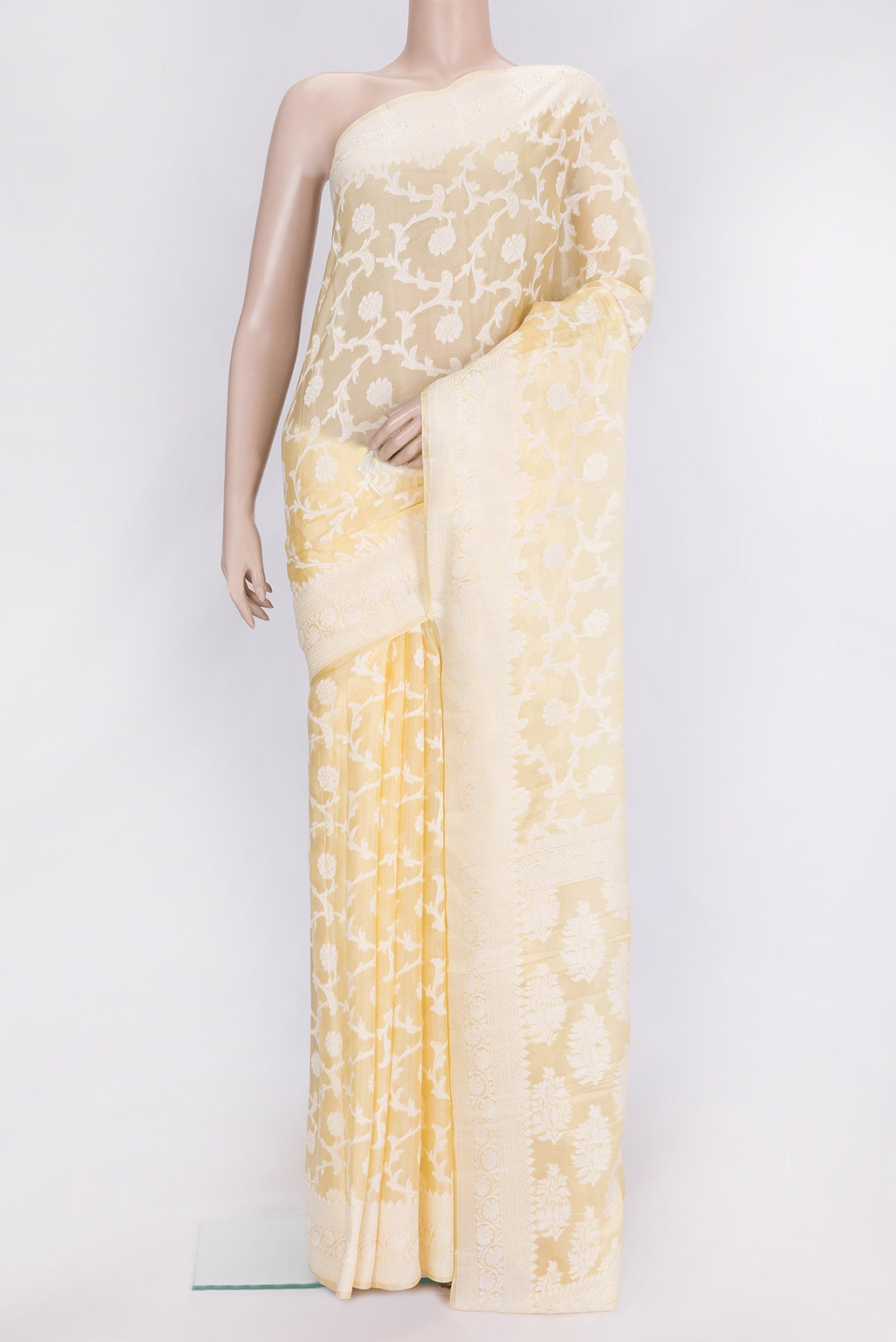 Sandal Dual Tone Mysore Georgette Saree with Zari Brocade on the body and Thread Border.  displayed on a mannequin