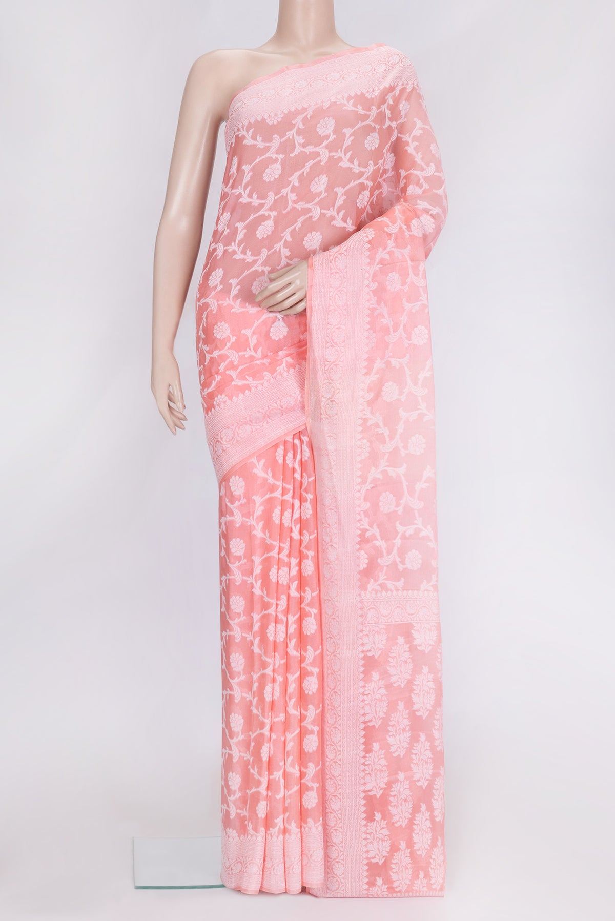 Pink Dual Tone Mysore Georgette Saree with Zari Brocade on the body and Thread Border.  displayed on a mannequin