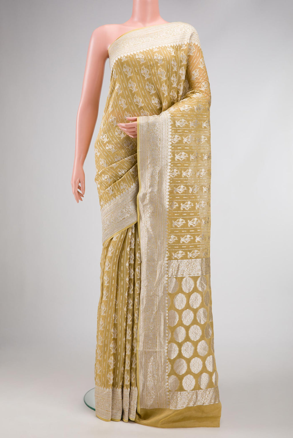 Mehandi Green Dual Tone Banarasi Georgette Saree with Zari Brocade on the body and Zari Border.  displayed on a mannequin