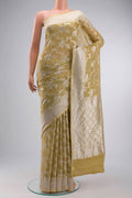 Beige Banarasi Georgette Saree with Zari Butta on the body and Zari Border displayed on a mannequin