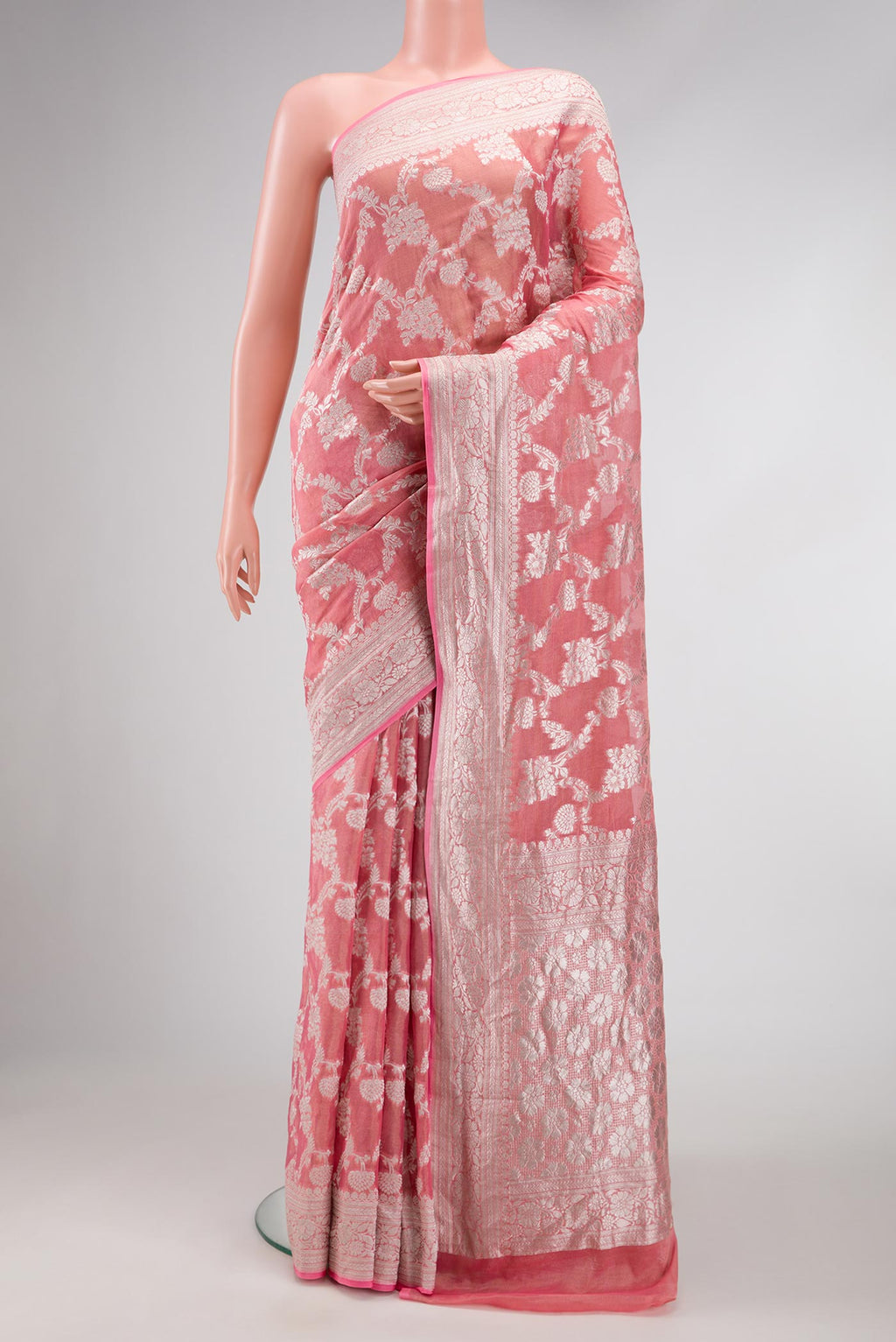 Pink Dual Tone Banarasi Georgette Saree with Zari Brocade on the body and Zari Border.  displayed on a mannequin