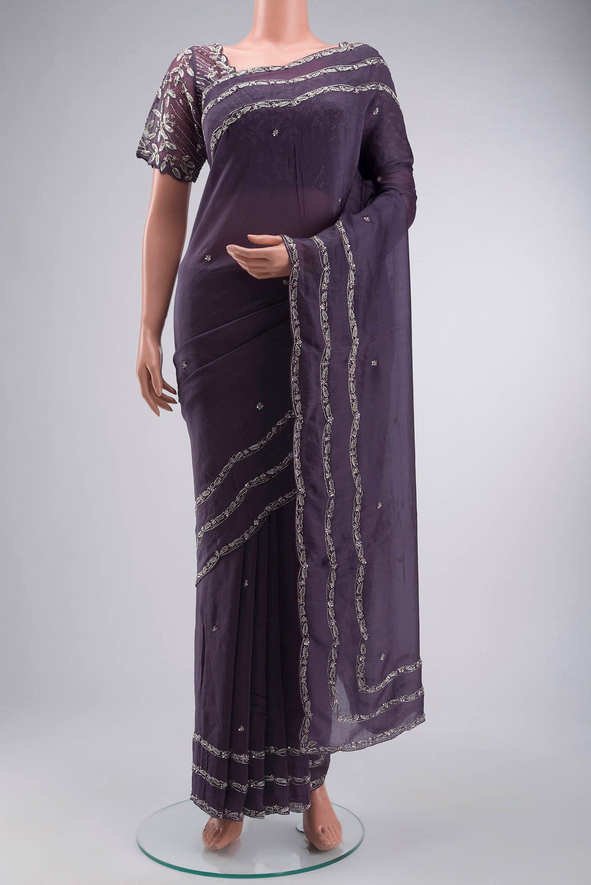 Lilac Satin Silk Saree with Plain Body and Embroidery Border displayed on a mannequin