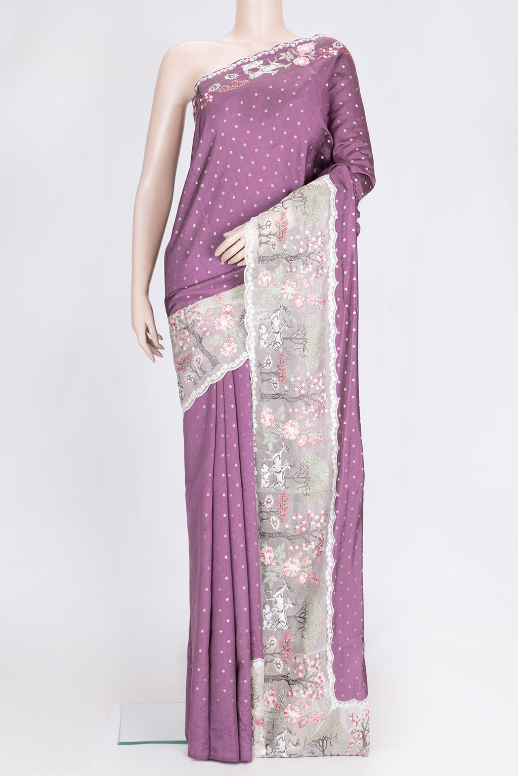 Purple Dual Tone Tussar Silk Saree with Zari Butta on the body and Embroidery Border.  displayed on a mannequin