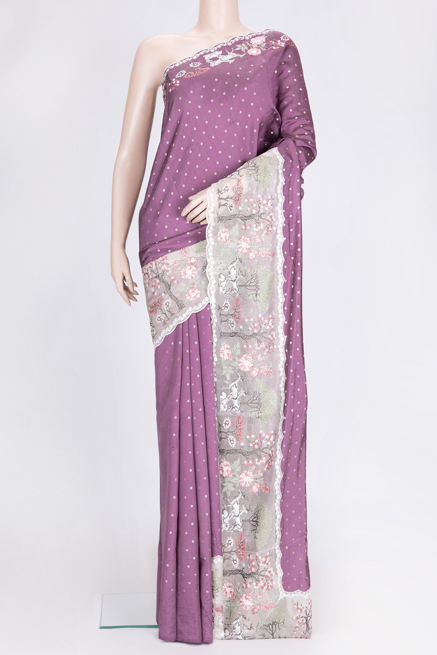 Purple Dual Tone Tussar Silk Saree with Zari Butta on the body and Embroidery Border.  displayed on a mannequin