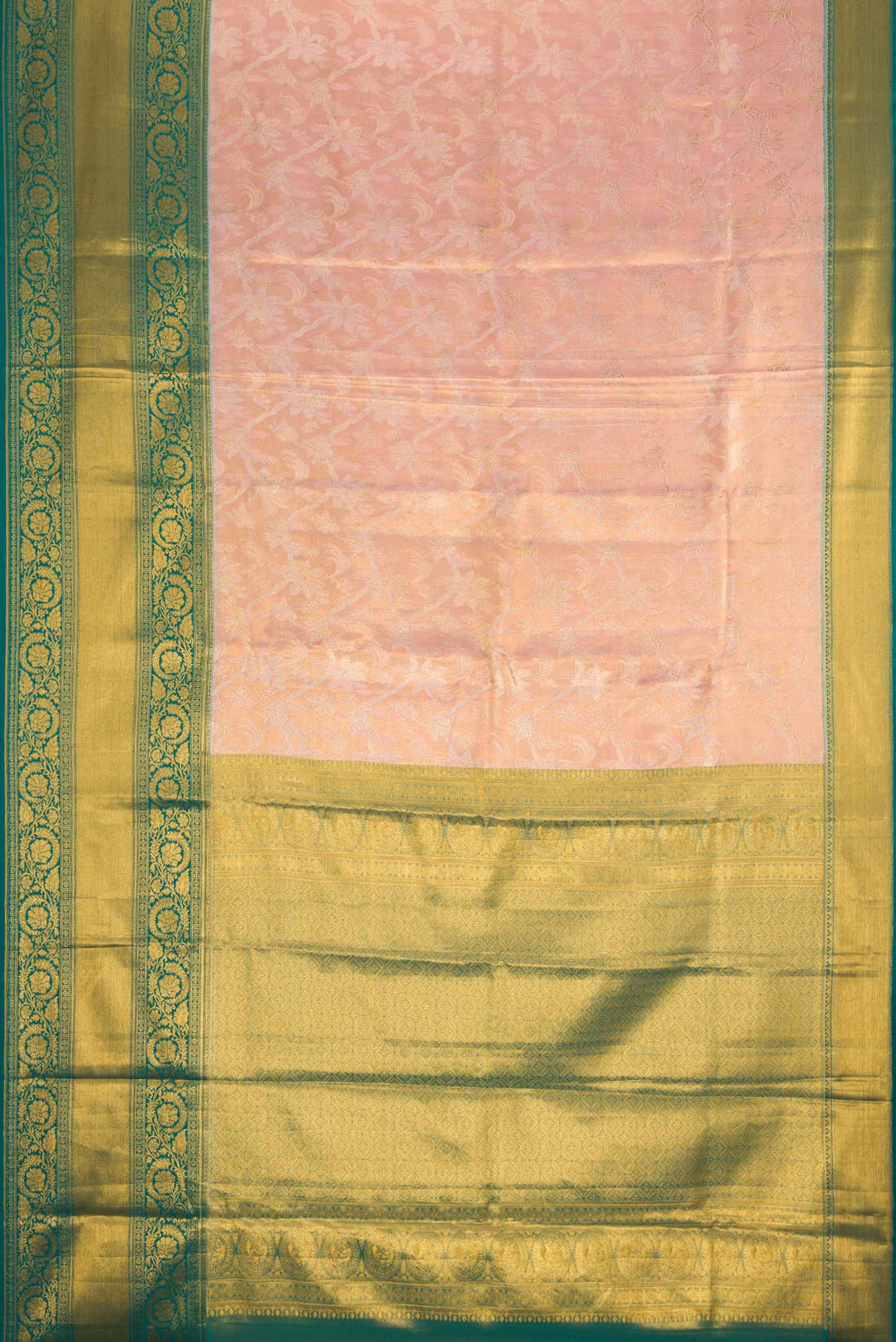 Flat view of Rose Gold Dual Tone Kanchipuram Tissue Silk Saree with Zari Brocade on the body and Zari Border. 