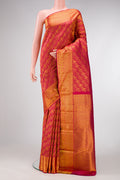 Pink Dual Tone Kanjivaram Silk Saree with Zari Brocade on the body and Zari Border.  displayed on a mannequin