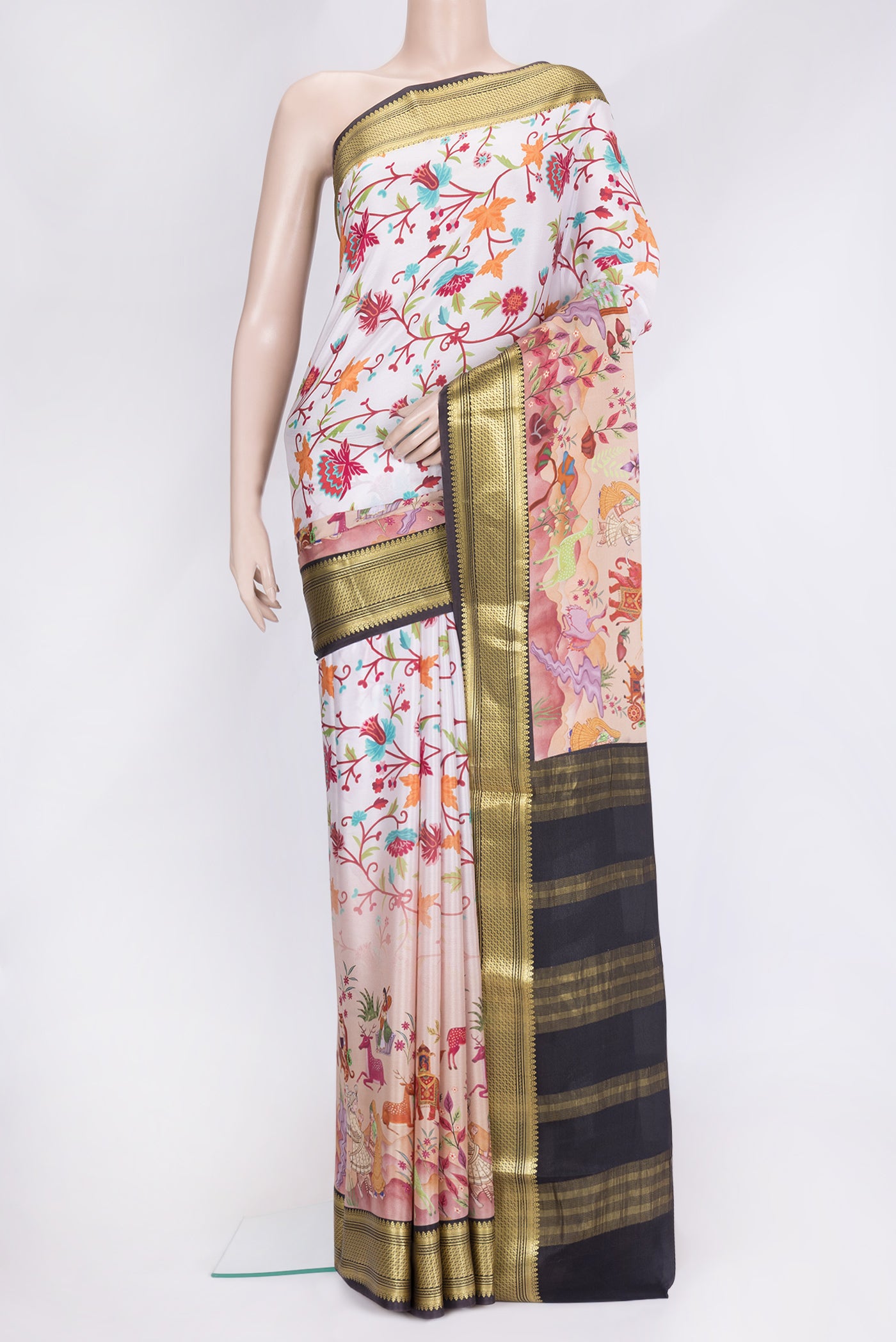 Off White Dual Tone Mysore Silk Saree with Printed design on the body and Fancy Border.  displayed on a mannequin