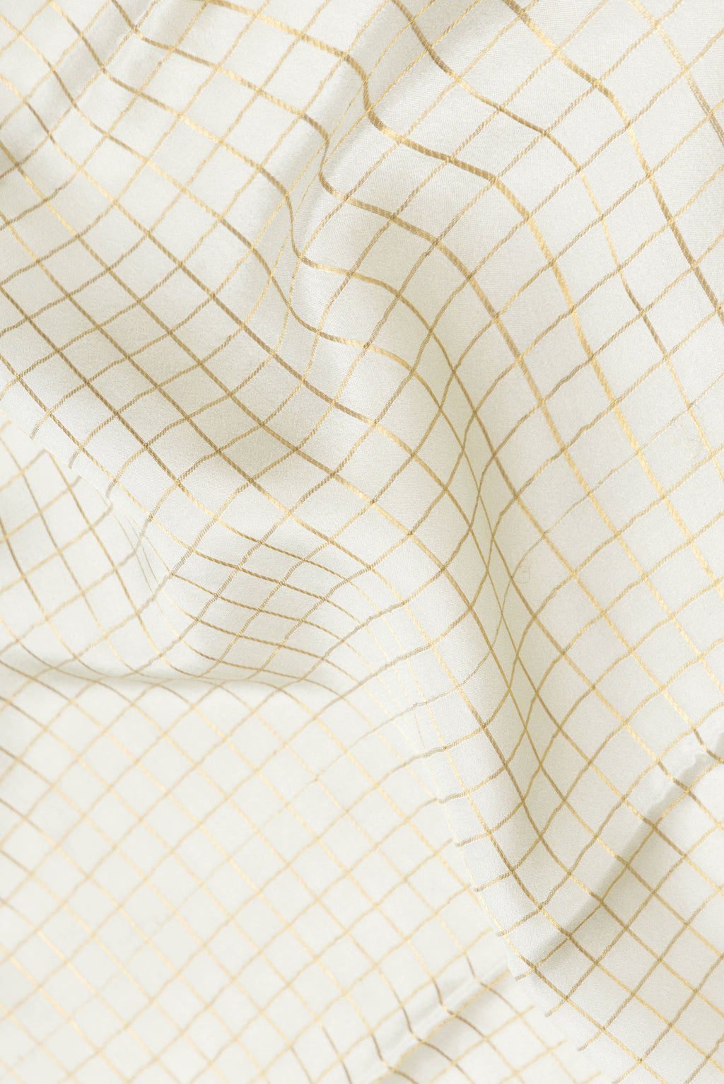 Close up of Pista Green Dual Tone Mysore Silk Saree with Checked design on the body and Fancy Border.  displaying folds