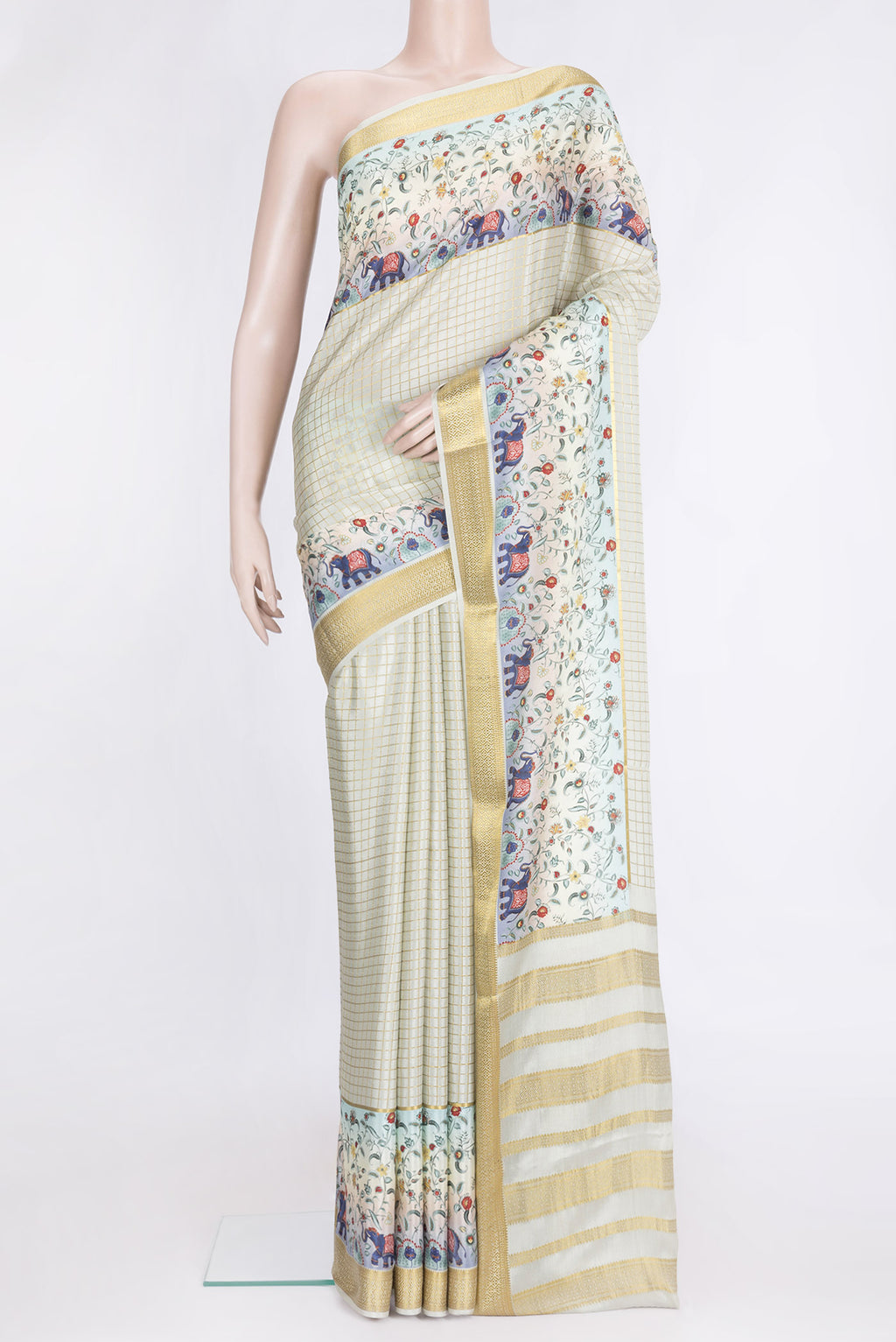 Pista Green Dual Tone Mysore Silk Saree with Checked design on the body and Fancy Border.  displayed on a mannequin