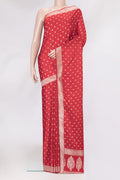 Red Blended Banarasi Silk Saree with Zari Butta on the body and Zari Border.  displayed on a mannequin