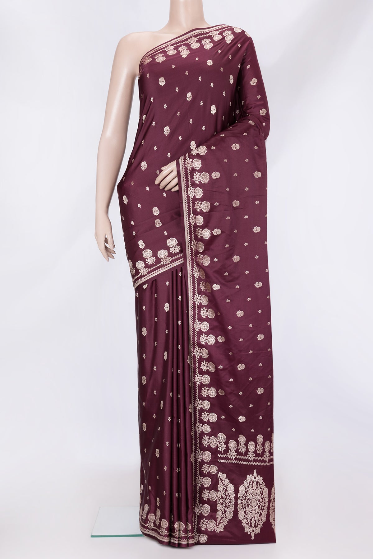 Burgundy Dual Tone Banarasi Silk Saree with Zari Butta on the body and Zari Border.  displayed on a mannequin