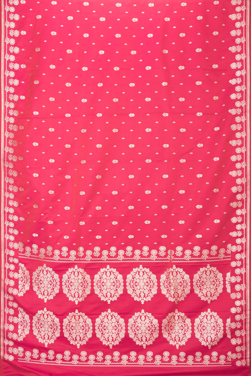 Flat view of Pink Blended Banarasi Silk Saree with Zari Butta on the body and Zari Border. 