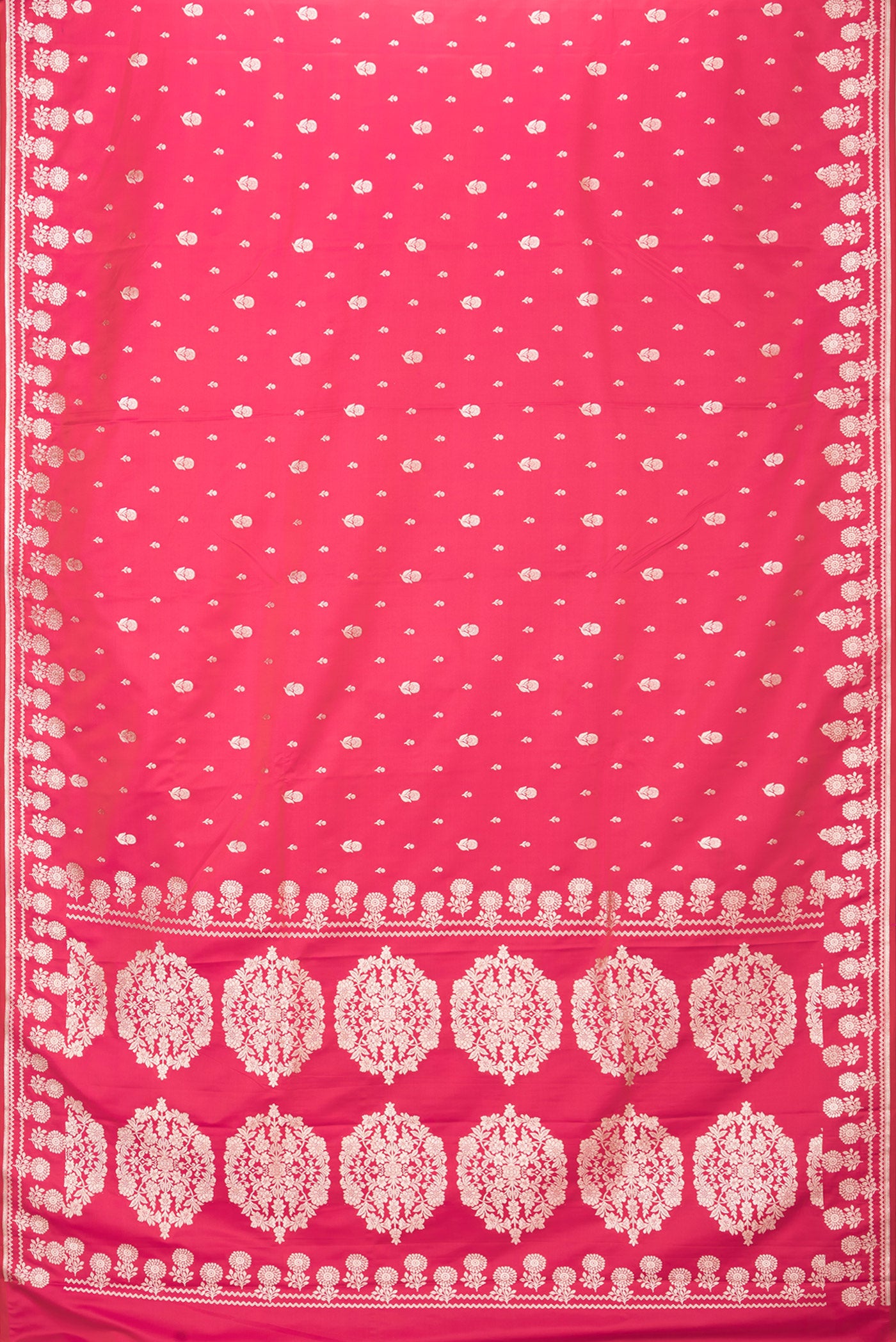 Flat view of Pink Blended Banarasi Silk Saree with Zari Butta on the body and Zari Border. 