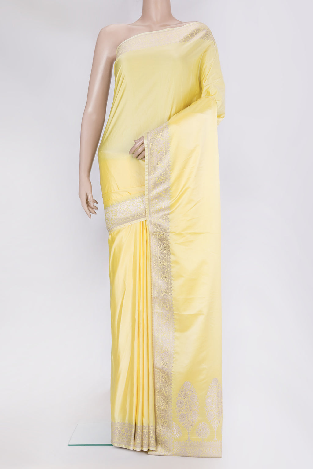 Lemon Yellow Blended Banarasi Silk Saree with Plain Body and Fancy Border.  displayed on a mannequin