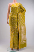 Green Blended Banarasi Silk Saree with Zari Butta on the body and Zari Border displayed on a mannequin