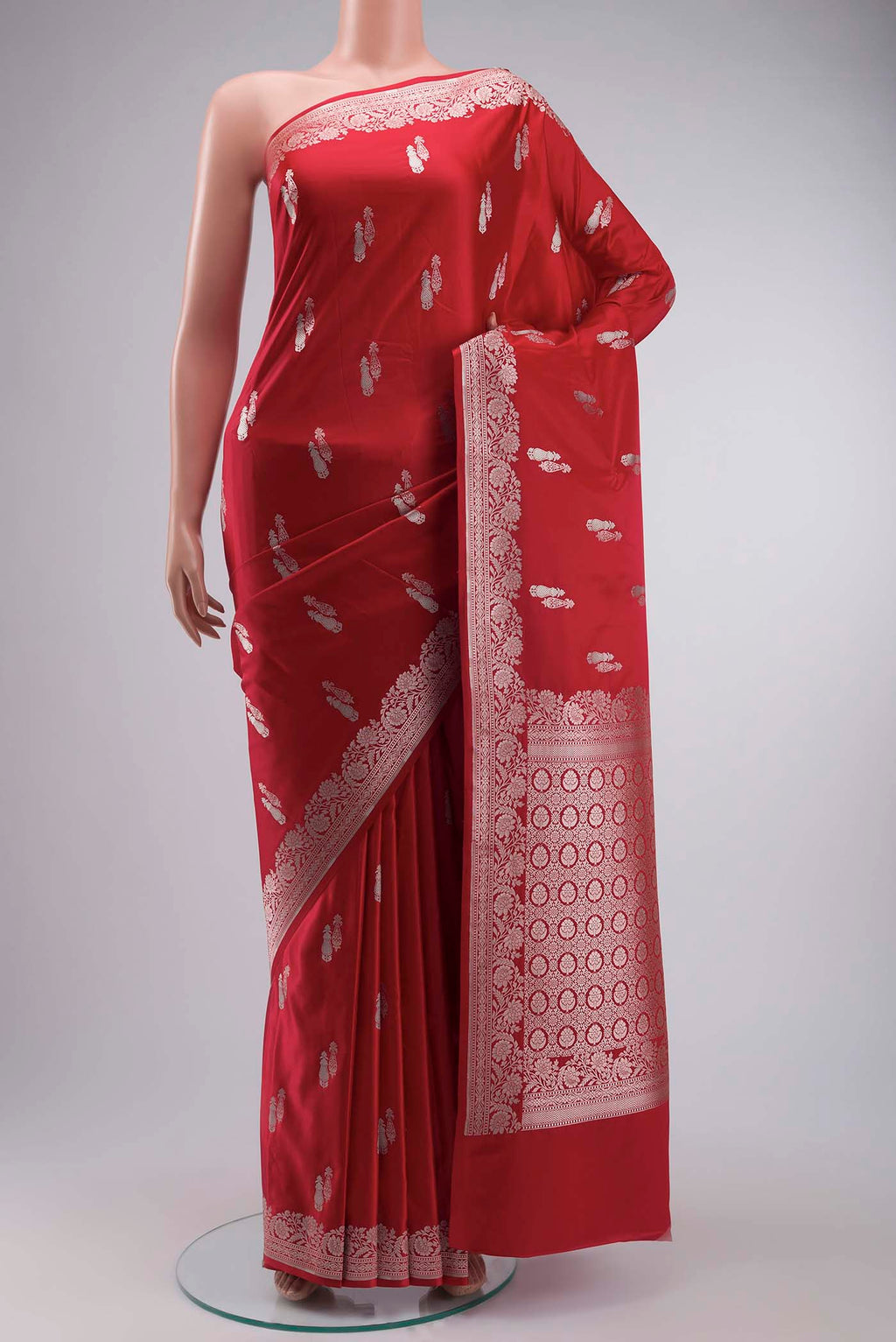 Red Blended Banarasi Silk Saree with Zari Butta on the body and Zari Border displayed on a mannequin