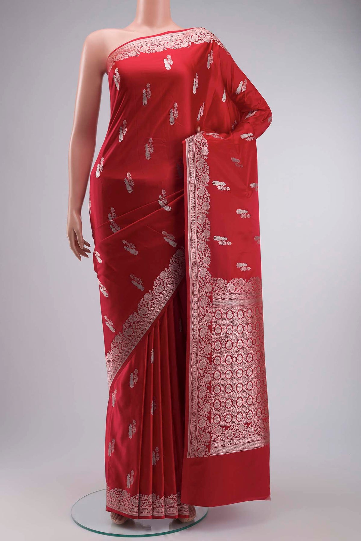 Red Blended Banarasi Silk Saree with Zari Butta on the body and Zari Border displayed on a mannequin