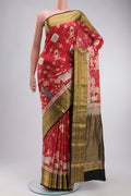 Red Printed Silk Saree with Printed design on the body and Zari Border displayed on a mannequin