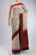 Green Printed Silk Saree with Printed design on the body and Thread Border displayed on a mannequin