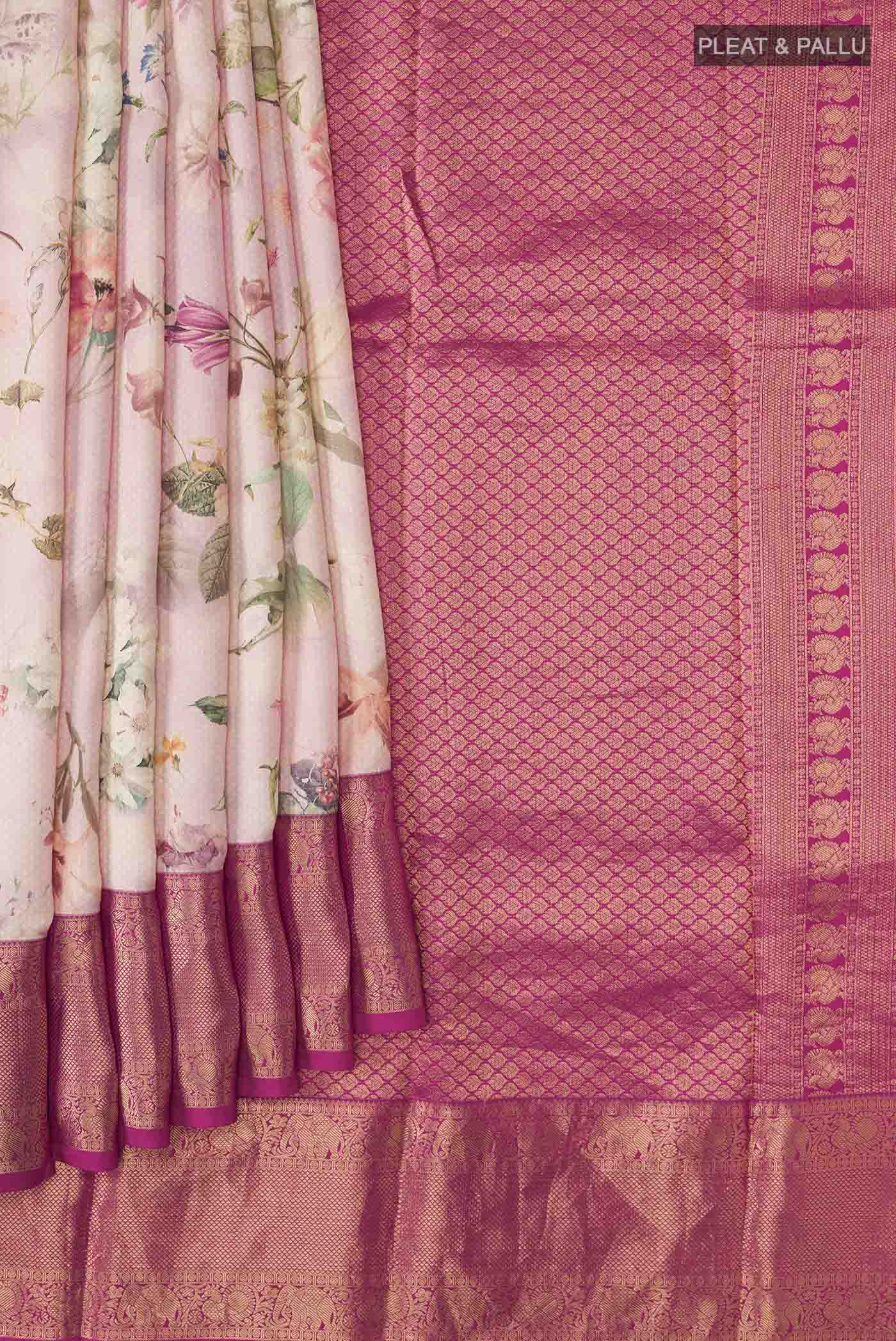 Pleats and pallu of Rose pink Printed Silk Saree with Printed design on the body and Zari Border