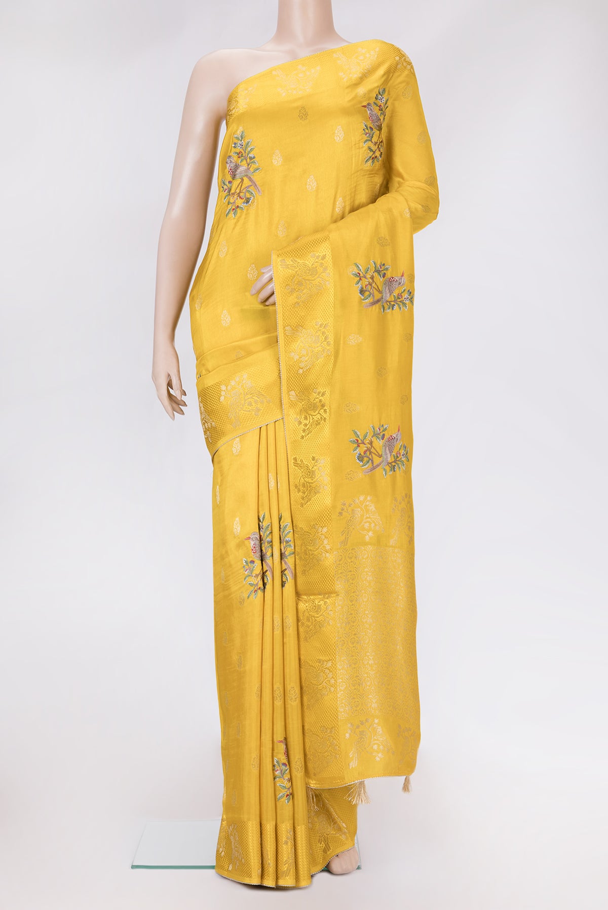 Yellow Dual Tone Tussar Silk Saree with Zari Butta on the body and Fancy Border.  displayed on a mannequin