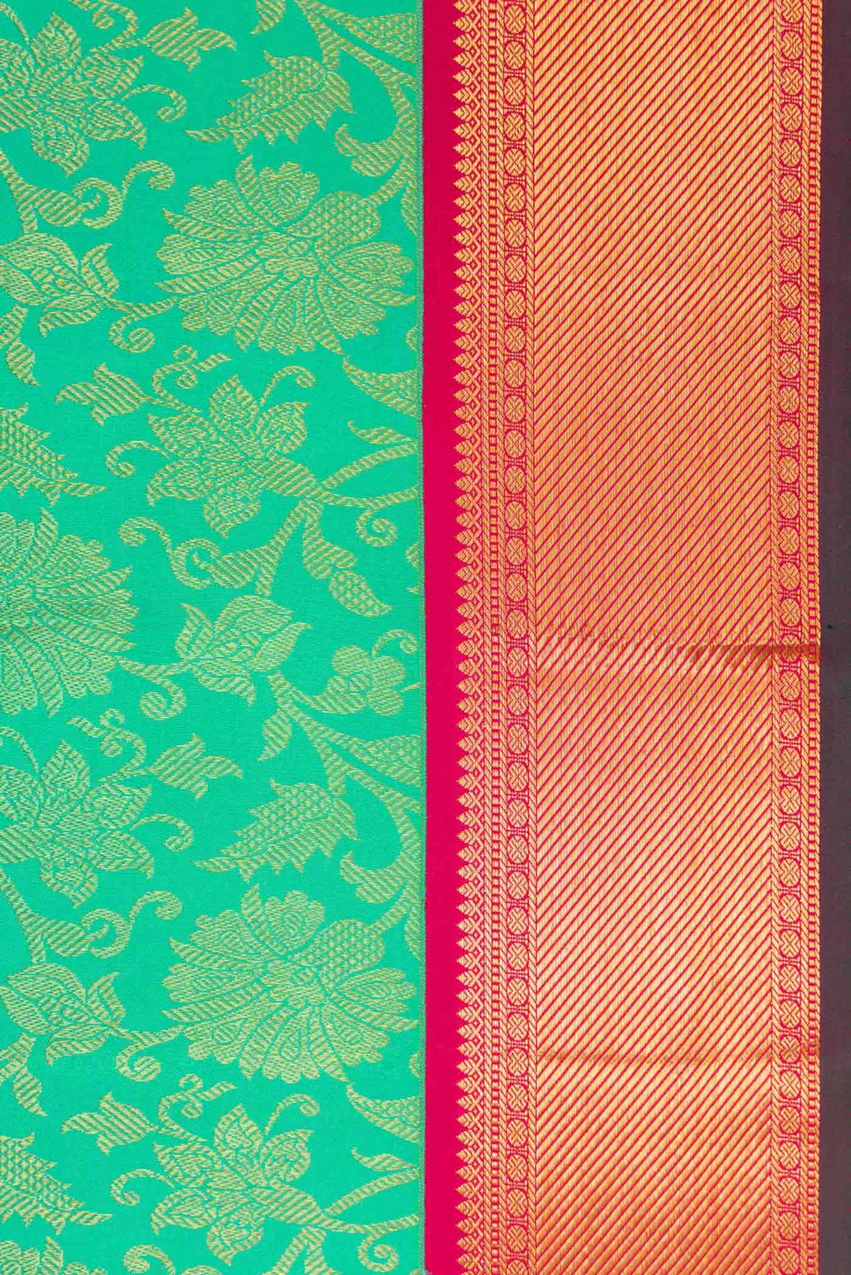 Border image of Sea Green Dual Tone Kanjivaram Silk Saree with Zari Brocade on the body and Zari Border. 