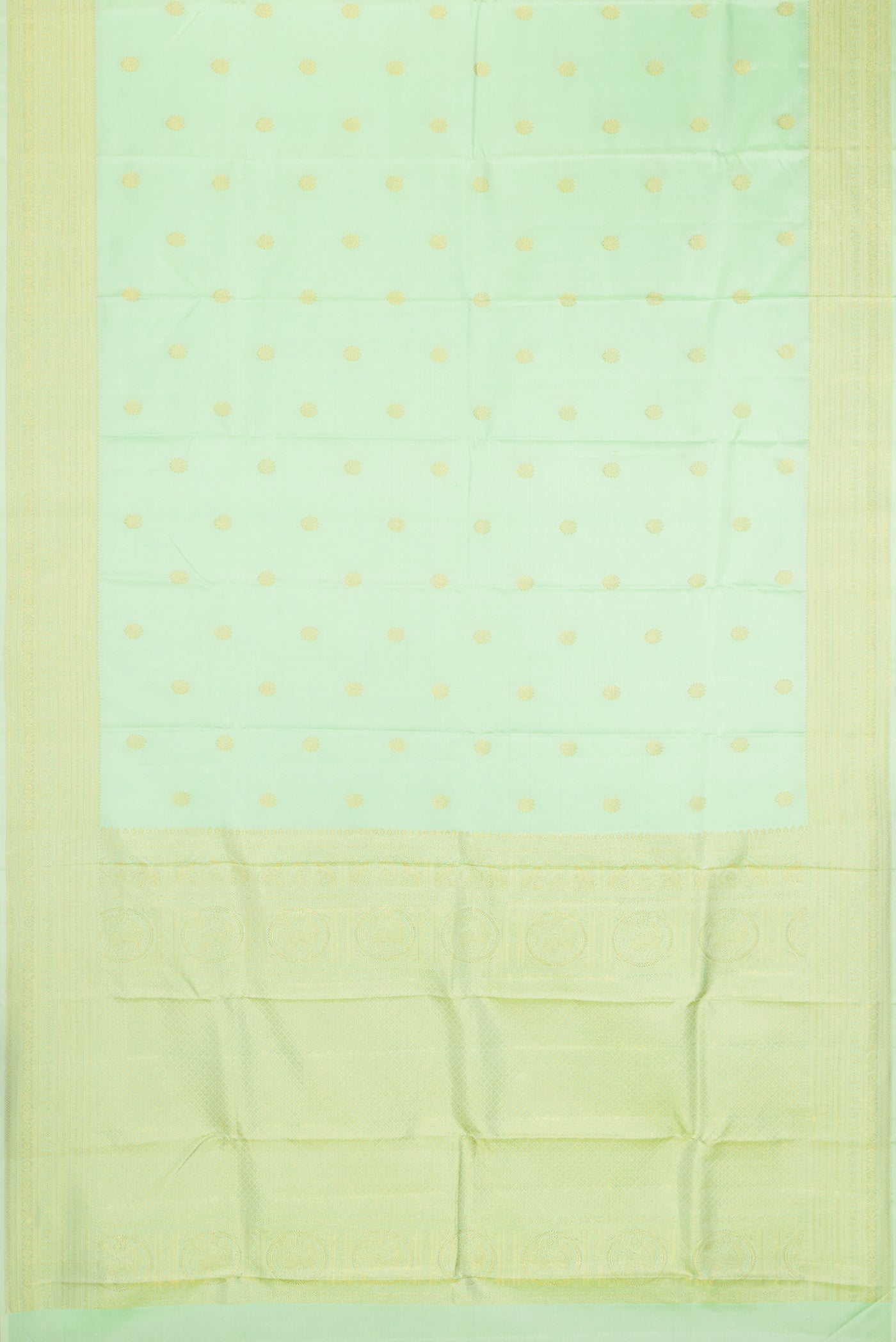 Flat view of Pista Green Kanchipuram Silk Saree with Zari Butta on the body and Zari Border. 