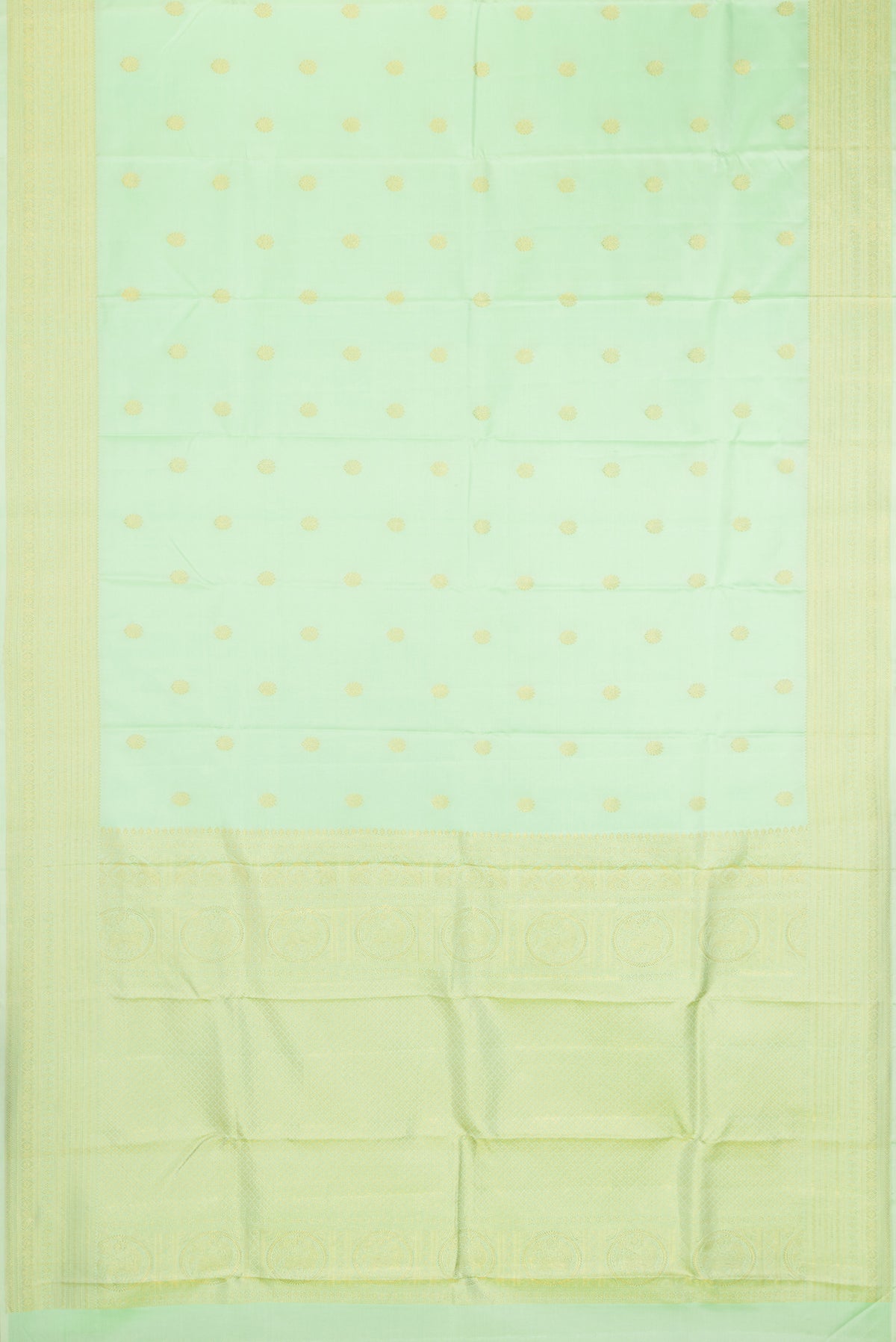 Flat view of Pista Green Kanchipuram Silk Saree with Zari Butta on the body and Zari Border. 