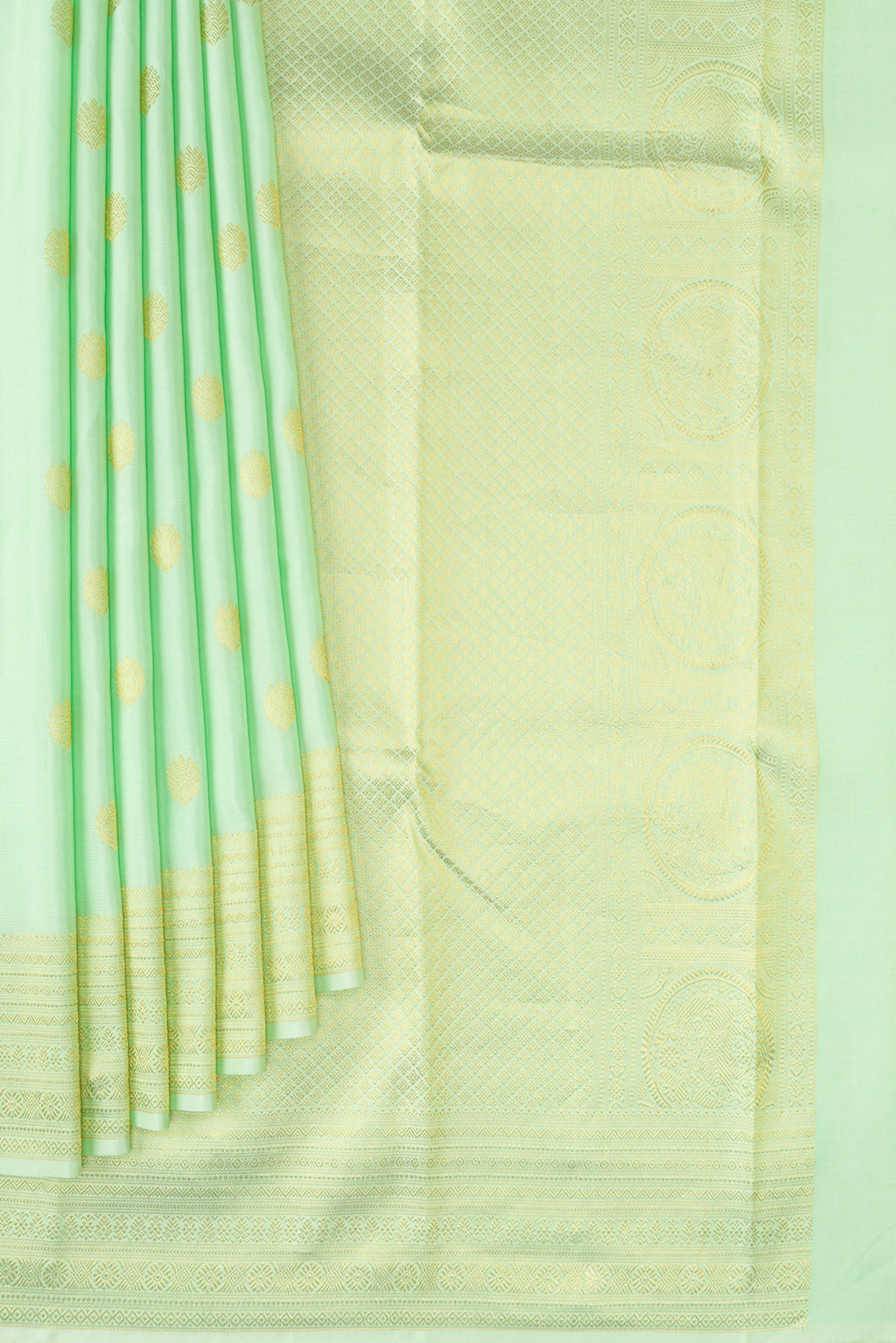 Pleats and pallu of Pista Green Kanchipuram Silk Saree with Zari Butta on the body and Zari Border. 