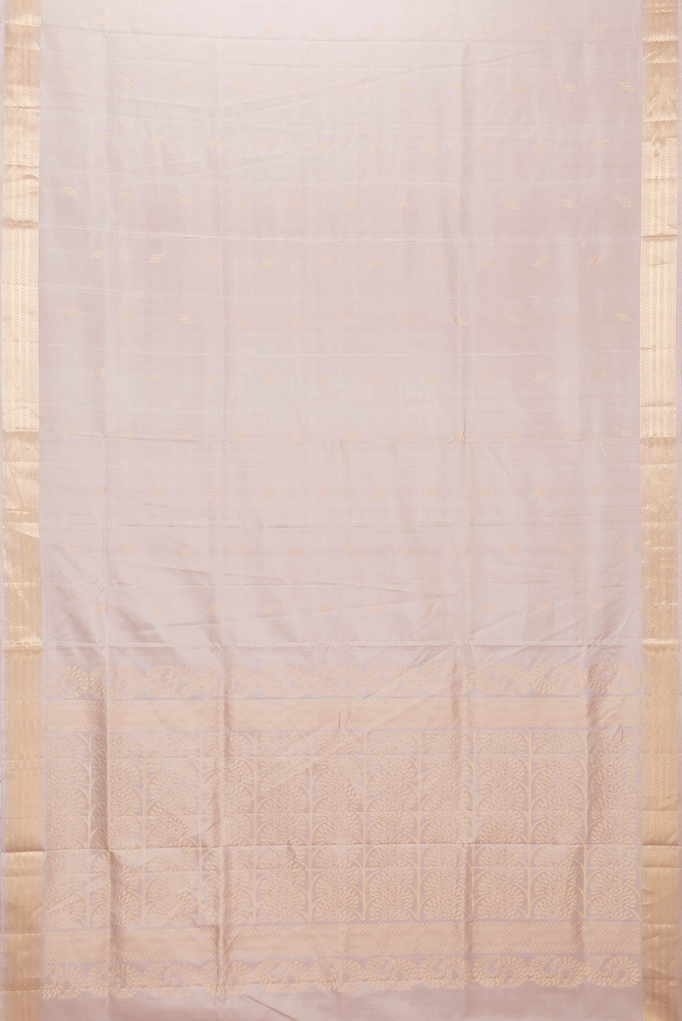 Flat view of Beige Dual Tone Soft Silk Saree with Zari Butta on the body and Zari Border. 