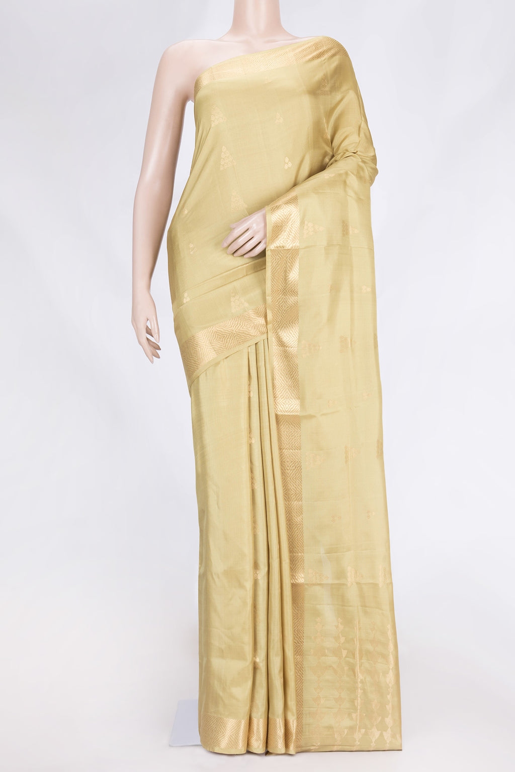 Pista Green Dual Tone Soft Silk Saree with Zari Butta on the body and Zari Border.  displayed on a mannequin