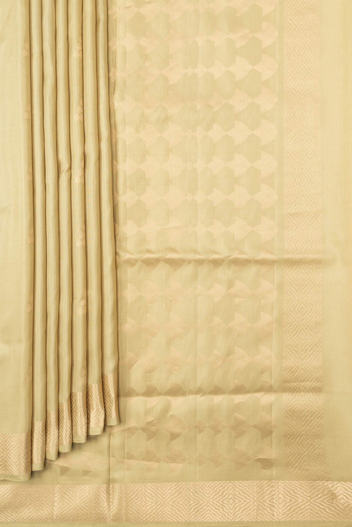 Pleats and pallu of Pista Green Dual Tone Soft Silk Saree with Zari Butta on the body and Zari Border. 
