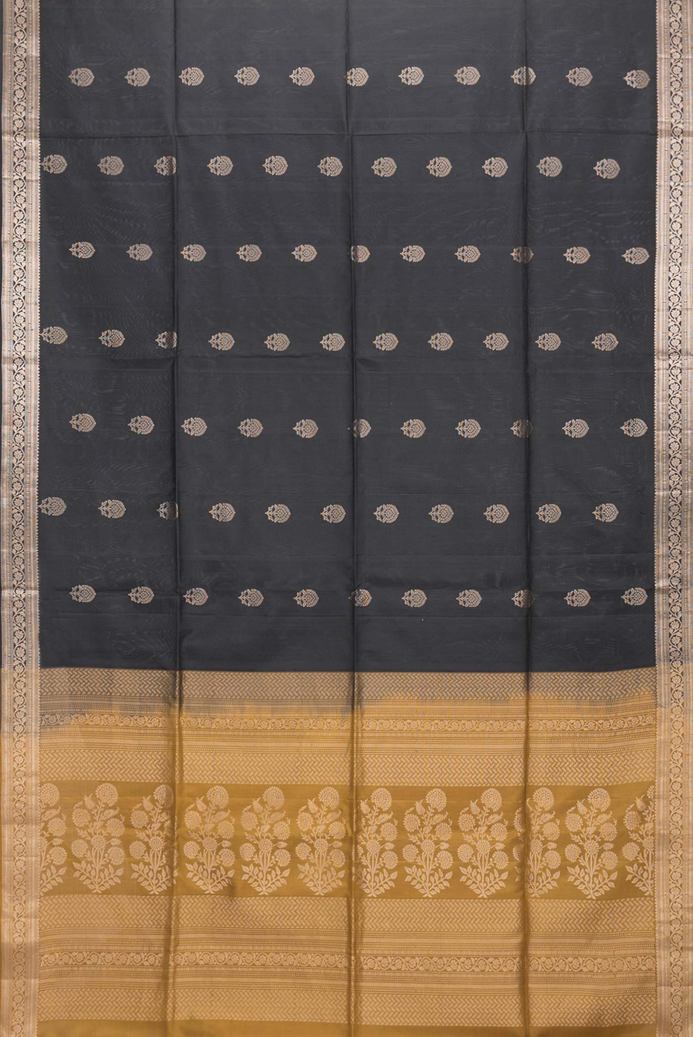 Flat view of Black Dual Tone Soft Silk Saree with Zari Butta on the body and Zari Border. 