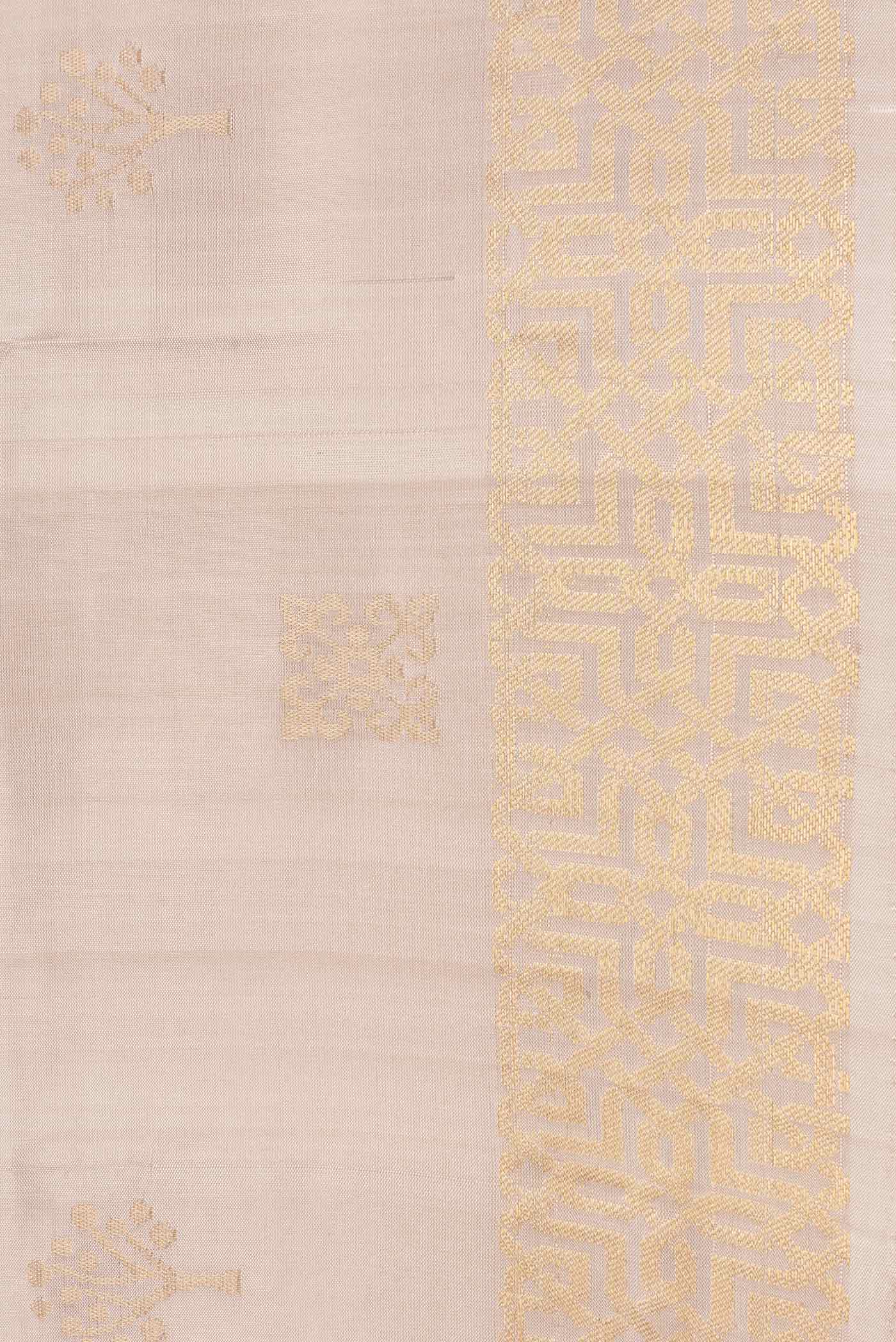 Border image of Beige Dual Tone Soft Silk Saree with Zari Butta on the body and Zari Border. 