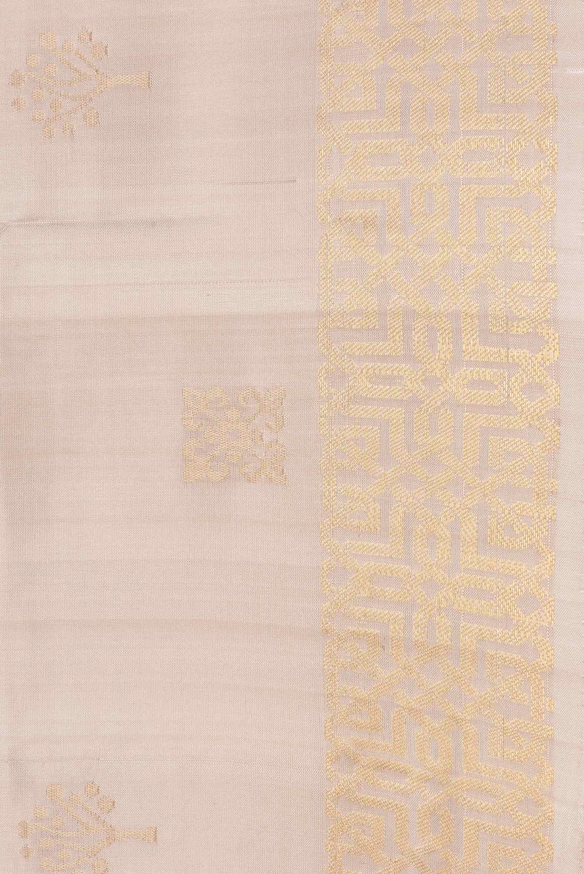 Border image of Beige Dual Tone Soft Silk Saree with Zari Butta on the body and Zari Border. 