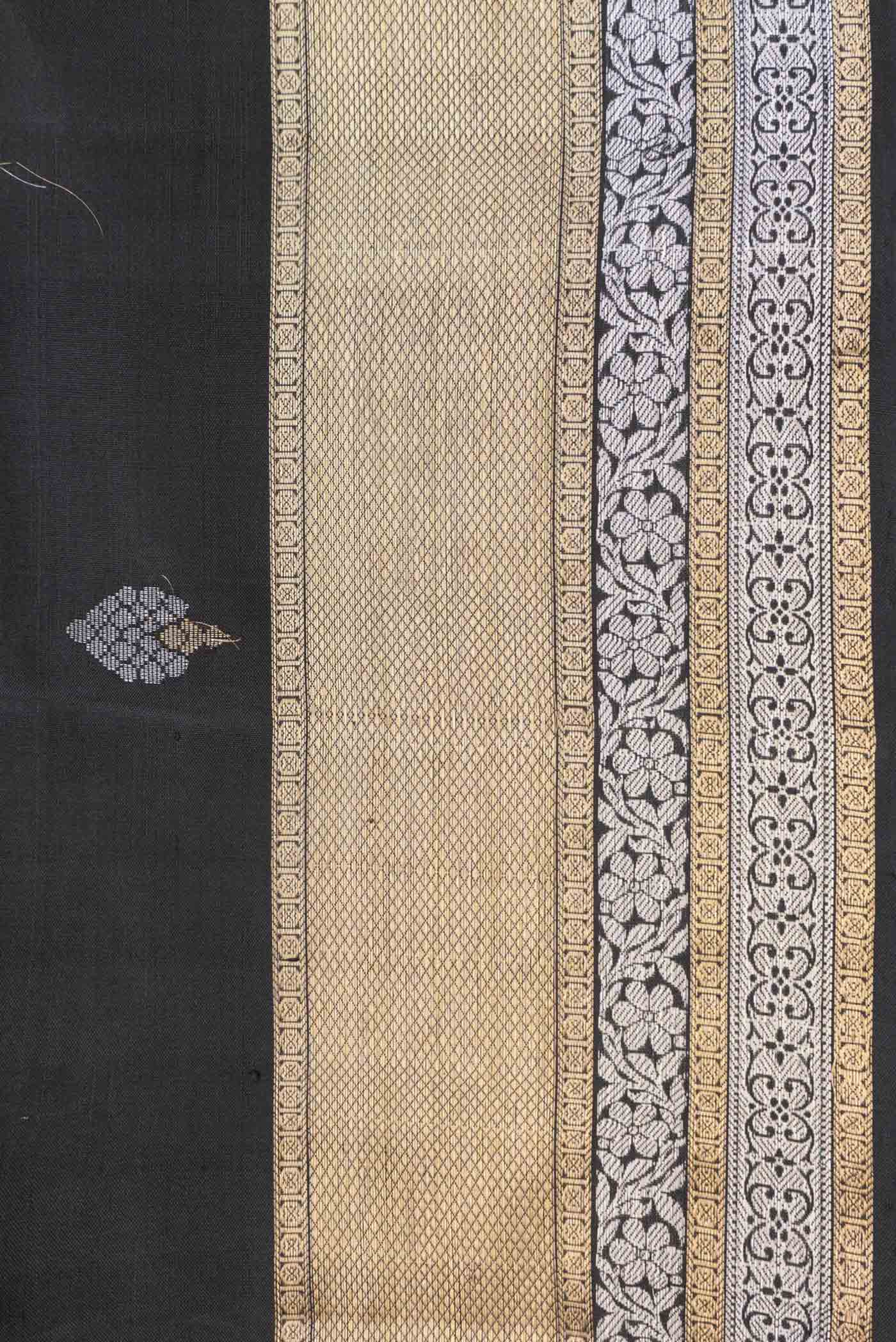 Border image of Black Dual Tone Soft Silk Saree with Zari Butta on the body and Zari Border. 