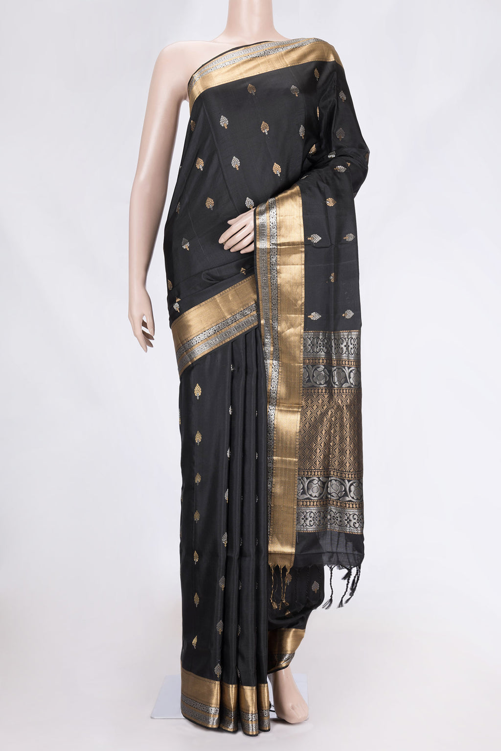 Black Dual Tone Soft Silk Saree with Zari Butta on the body and Zari Border.  displayed on a mannequin
